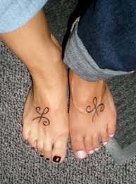 friendship symbol tattoo