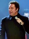 http://img.karaoke-lyrics.net/img/artists/12344/tom-jones-38503.jpg