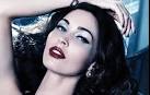 Sporting ebony hair, blood red
