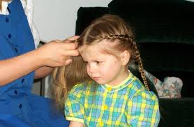 The Hutterite Style Photo by: Lisa Waldner Traditionally, young Hutterite girls\u0026#39; hair were braided in the front and back. - key4-599x392