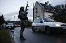 French forces kill newspaper attack suspects, hostages die in.