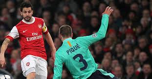 Cesc Fábregas durante el encuentro de la pasada temporada que le enfrentó al Barcelona