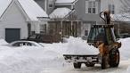 Another big storm blankets New England with snow, may last days.