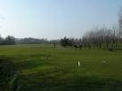 with two budding Tiger Woods's heading for the tee nearest the camera. - via Daymix