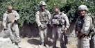 four US Marines urinating