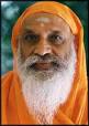 On the banks of the Ganga lives Swami Dayananda of Manali. - Swami.Dayananda