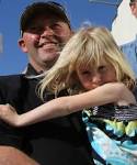 Tony Sears and his daughter Molly, 5, outside The Hanger in Hawera. - 6143574