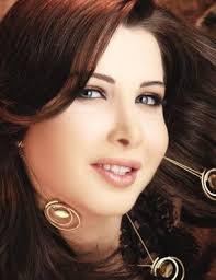 صور نانسي عجرم ... Images?q=tbn:ANd9GcQB0Z0gQ0sUuz4NfYXzeosbE67kRsi9HEqIVhtRVd6i9fdsTcJPjA