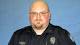 Man slain in Ariz. robbery linked to officer's death