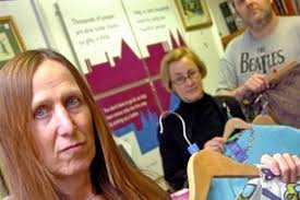 Carol Childs, manager of Walton&#39;s Cancer Research UK shop, with staff members Paula Bauer and David Dopson. DONATED goods destined for the shelves of ... - C_67_article_2113543_body_articleblock_0_bodyimage