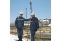 Ali Erener, project chief engineer, and Ílker Karadag, operation chief of oil movement together with the antenna unit. The Smart Wireless THUM Adapter ... - 42259