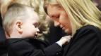 Christine Russell, right, looks down at her son Nolan Russell, 2, ... - 800_cp_widow_child_110118