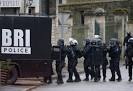 French forces kill newspaper attack suspects, hostages die in.