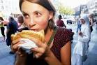 Girl eating doner kebab in