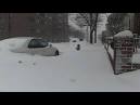 Another big storm blankets New England with snow, may last days.