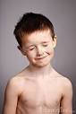 NAKED BOY WITH EYES CLOSED