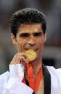 Gold medalist Hadi Saei of Iran poses on. Von: JUNG YEON-JE