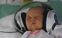 Newborn Nela listens to music