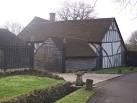 Ring Cottage. On Wissenden Lane. Tudor-built cottage with elaborate iron - via Daymix