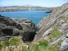 Chasm on the north side of the land bridge between promontory and mainland - via Daymix