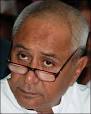 Naveen Patnaik is sitting at