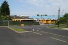 Yellow school buses at First's - via Daymix
