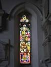 see TQ3769 : St. George's Church - stained glass window "City of God". - via Daymix