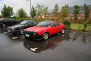Lancia Montecarlo in red next to one in black -- Car Pictures