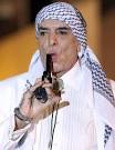Feroz Khan holds a plastic gun
