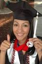 Political science grad Linda Vasquez shows off her honor society medallion. - commencement-12