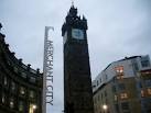 NS5964 : Tolbooth Steeple and Merchant City sign - via Daymix