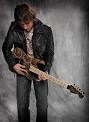 http://www.musicplayers.com/features/guitars/2010/images/WarrenDeMartini.jpg