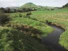 footbridge is Chrome Hill. - via Daymix