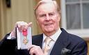 Ian Carmichael with OBE at