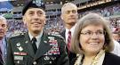 David and Holly Petraeus stand on the field before the NFL Super Bowl XLIII ...