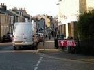 The sign of the Man on the Moon pub is visible on the right, - via Daymix