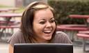 Students: how to be boss-friendly online - Student-laughs-at-laptop-008