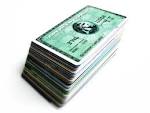 A pile of credit cards. - via Daymix