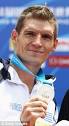 Greece lightning: Spyros Gianniotis. The first person to carry the Olympic ... - article-2140143-12B27B86000005DC-830_233x423