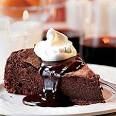 Chocolate Clementine Cake with Hot Chocolate Sauce Recipe | MyRecipes.