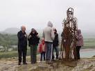 My family with the Iron Man sculpture influenced by the design of the - via Daymix