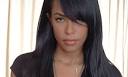 Aaliyah poses with hair over