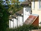 Satellite TV dishes are everywhere now beaming the dirty digger's output - via Daymix