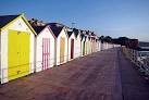Preston Sands Prom. Beach huts on Preston Sands promenade. - via Daymix