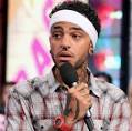 + Travis McCoy isn't exactly thrilled with his girlfriend's (musical) ... - travismccoy-headbandmic