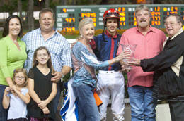 Ron Hartley presents the PCQHRA Breeders\u0026#39; Futurity trophy to Tony and Molly Doughtie with trainer Paul Jones and family. Scott Martinez Photo - StelMyCorona_Pres