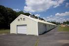 An exterior view of a hangar - via Daymix