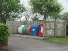 The community recycling bins on the forecourt of the former Primary School - via Daymix