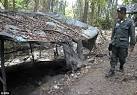 Malaysia finds graves of suspected trafficking victims - Florida.
