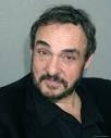 John Rhys-Davies began acting in Shakespeare plays at the age of thirteen at ... - E5VTD00Z